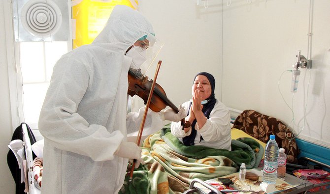 Dokter di Tunisia Hadapi Covid 19 dengan Biola